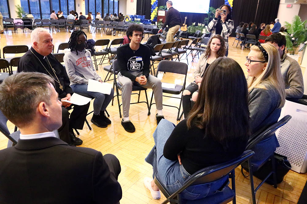 Philadelphia Archbishop Nelson Pérez joins college students, other young adults and ministry leaders during a synodal listening session at La Salle University April 4, 2022. (CNS/CatholicPhilly.com/Sarah Webb)